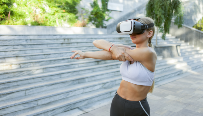Woman working out using VR headset