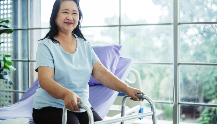 woman with walker demonstrating SSDI and physical disabilities