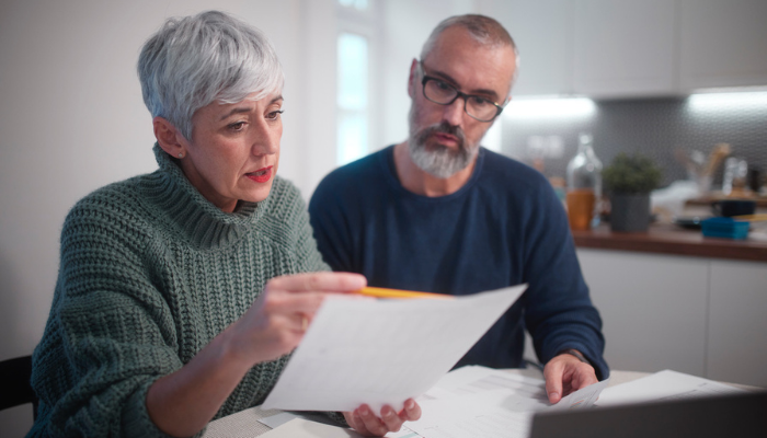 Couple reviewing their medicare plan documentation