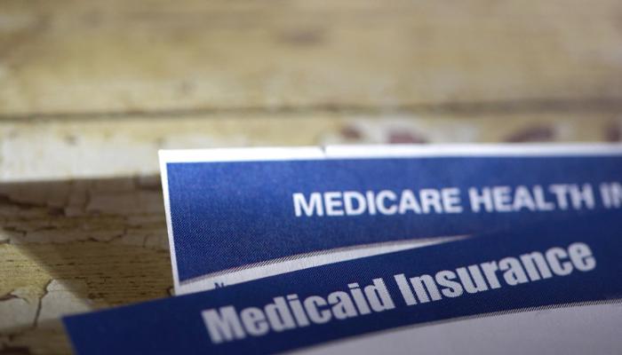 Medicare vs. Medicaid paperwork.