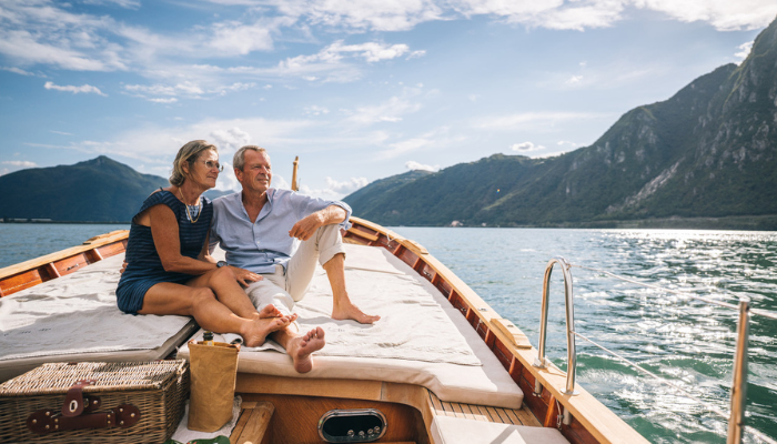 Senior couple enjoying vacation on a boat.