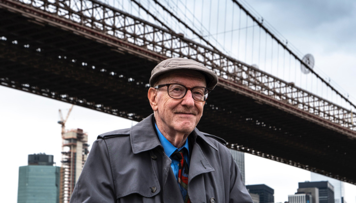 Senior man under the Brooklyn Bridge in NYC.